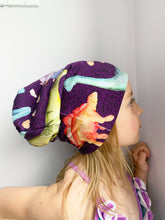 Load image into Gallery viewer, Dinosaurs on Purple Slouchy Beanie
